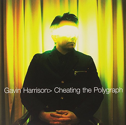 Album cover for Gavin Harrison’s “Cheating The Polygraph”, man with glowing eyes.