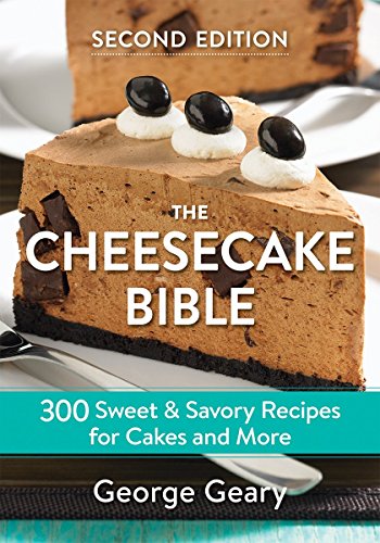 Cheesecake with chocolate and olives on the cover of a cookbook.
