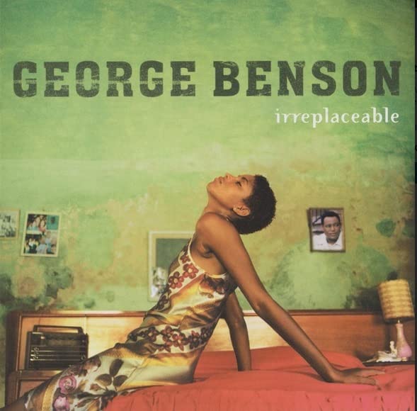 Album cover for “Irreplaceable” by George Benson, featuring a woman reclining.