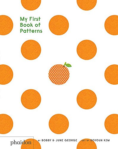Book cover with orange polka dots and a patterned tangerine.