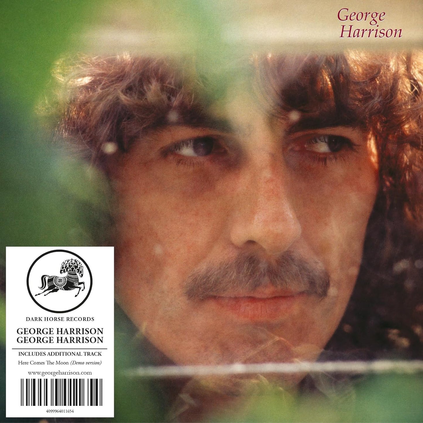 CD cover for George Harrison’s album, featuring a portrait of the artist.