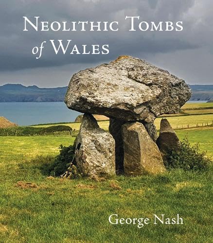 A large Neolithic stone tomb stands in a grassy field overlooking a coastal landscape.