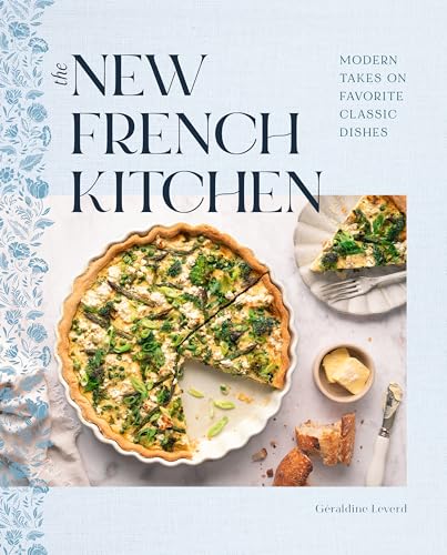 Cookbook cover featuring a quiche, bread, and butter on a white surface.