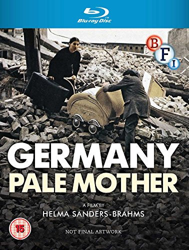 A woman and man with a pram walk through a pile of building rubble.