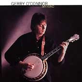Man in black shirt plays banjo against a dark, purple-hued background, album cover art.