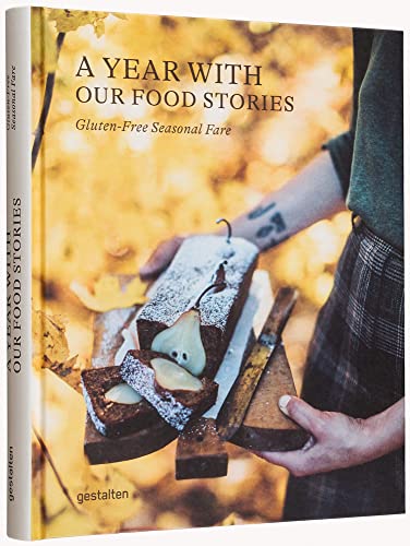 Cookbook cover featuring sliced loaf with pears, titled "A Year with Our Food Stories.