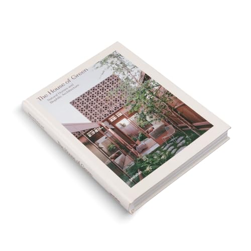 Hardcover book titled The House of Green featuring a photo of modern biophilic architecture.