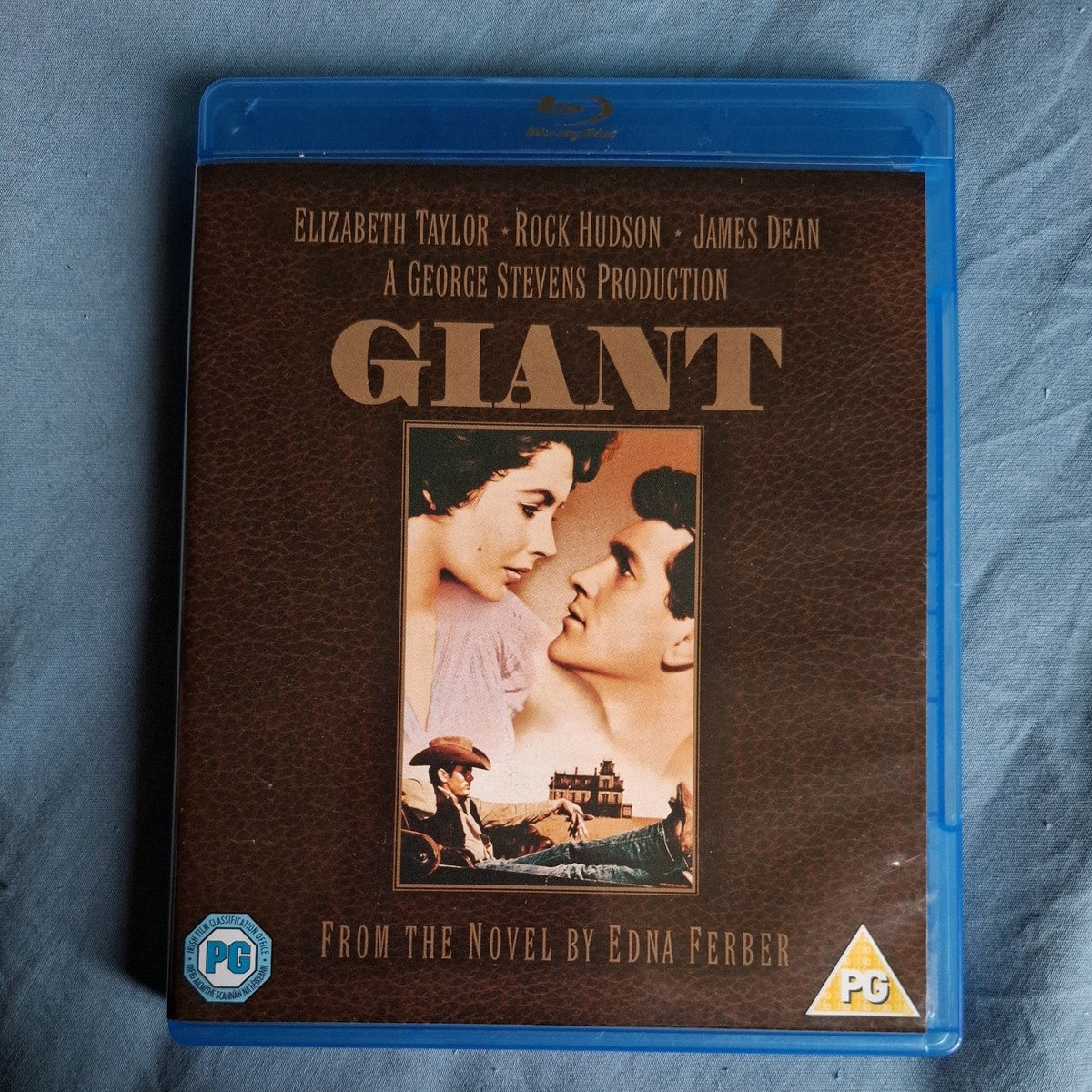 Blu-ray case for the film "Giant" featuring Elizabeth Taylor and Rock Hudson.