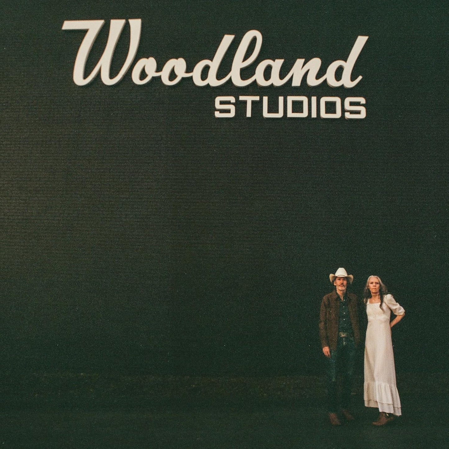 Album cover for Gillian Welch & David Rawlings’ “Woodland” with two figures.