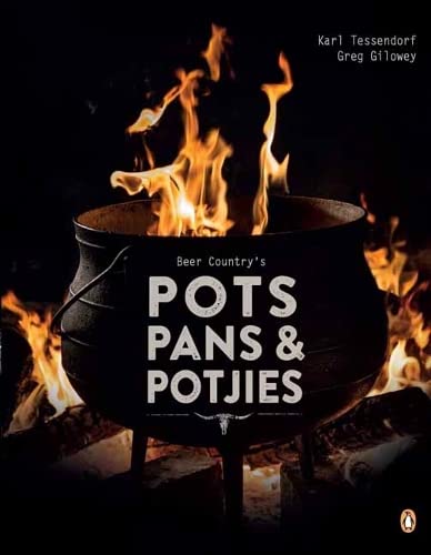 Black pot over a fire, book cover with white text.