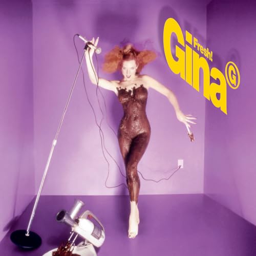 Album cover for Gina G’s “Fresh!” featuring a singer in a purple room.
