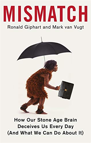 Book cover: caveman with briefcase under umbrella, titled "Mismatch.