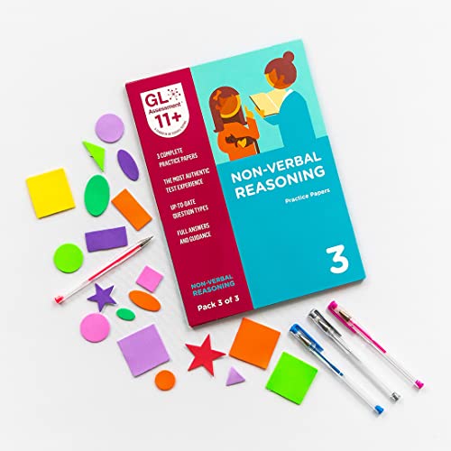 11+ non-verbal reasoning practice papers with colorful geometric shapes and pens.