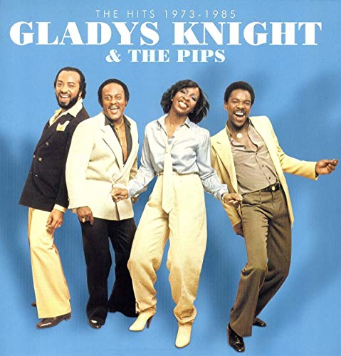 Gladys Knight and The Pips posing together against a solid blue background.