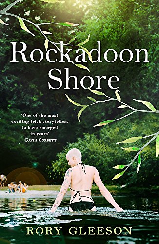 Book cover: woman wading in water, lush green foliage, title “Rockadoon Shore”.