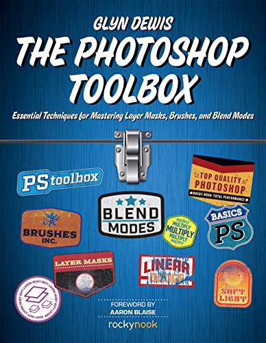 Book cover for The Photoshop Toolbox featuring various stylized tool labels on blue background.