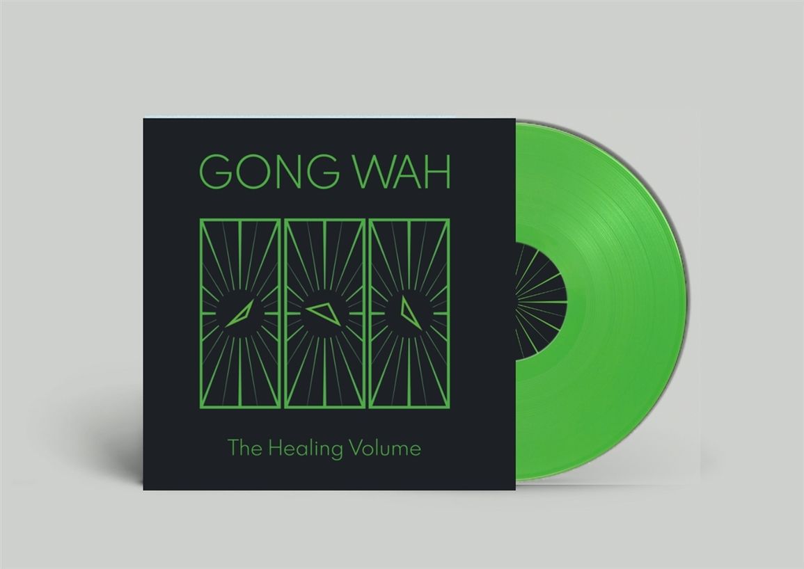 Black album cover with green text and a neon green vinyl record.