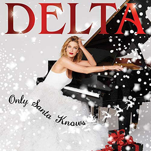 CD cover: Delta Goodrem posing by a grand piano with snowflakes.