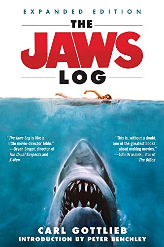 “The Jaws Log” book cover with a shark and swimmer illustration.
