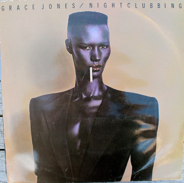 Grace Jones’ “Nightclubbing” vinyl album cover, portrait with cigarette holder.