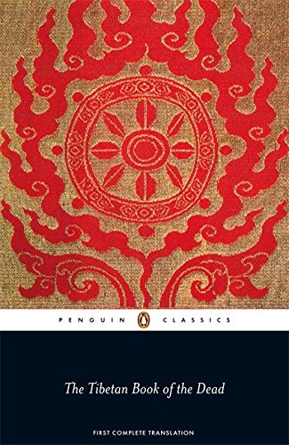 Book cover with a red dharma wheel and flames on a textured gold background.