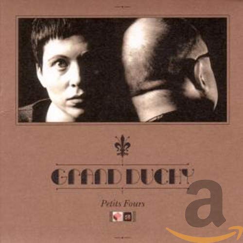 CD cover for Grand Duchy’s “Petit Fours” featuring two faces in profile.