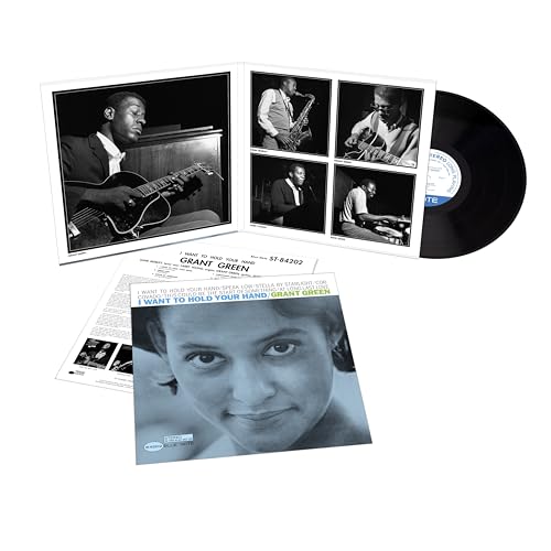 Grant Green vinyl record with black and white insert photos.
