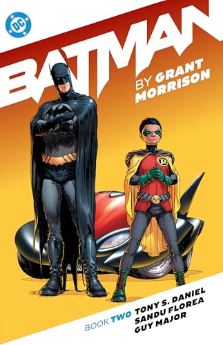 Batman and Robin stand before the Batmobile on a yellow and white cover.