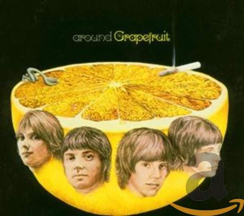 Album cover: grapefruit slice with band members’ faces inside.