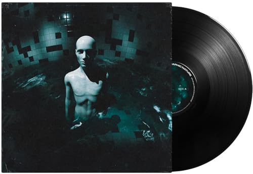 Vinyl record with album cover featuring a mannequin in a tiled room.
