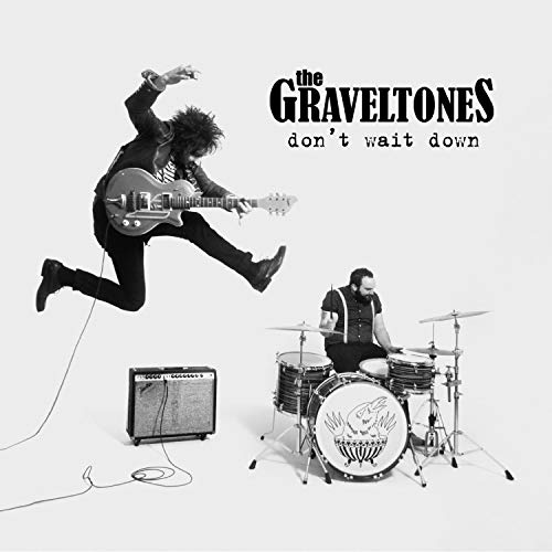 Black and white album cover featuring two musicians with instruments.