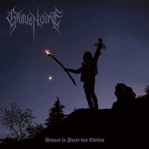 Silhouette holding a flaming staff against a twilight sky with a crescent moon.
