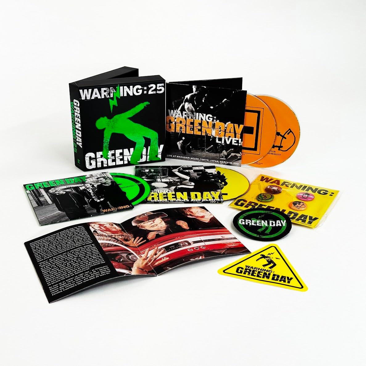 Green Day "Warning: 25" 4CD boxset with album artwork and stickers.