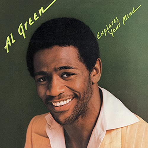 Al Green album cover: portrait of a smiling man on green background.