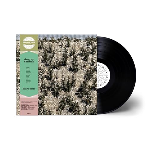 Vinyl record of "Extra Stars" by Gregory Ulhmann with pixelated cover art.