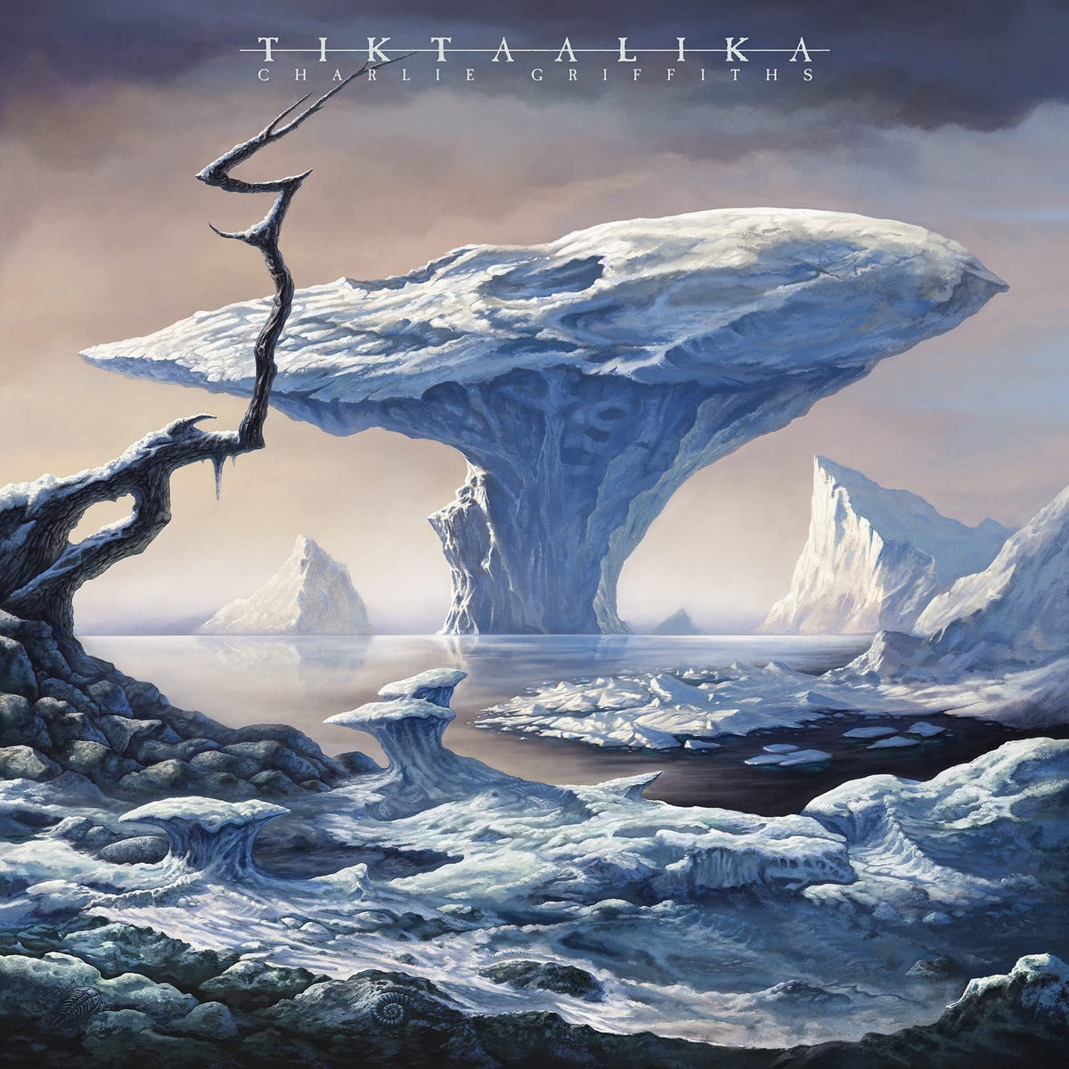 Album cover art: icy landscape with floating iceberg and twisted tree under a cloudy sky.