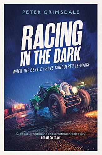 Book cover: vintage race car headlights illuminate a dark, wet track.