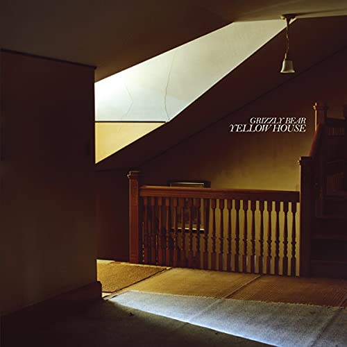 Album cover for Grizzly Bear’s “Yellow House” showing a wooden attic interior.