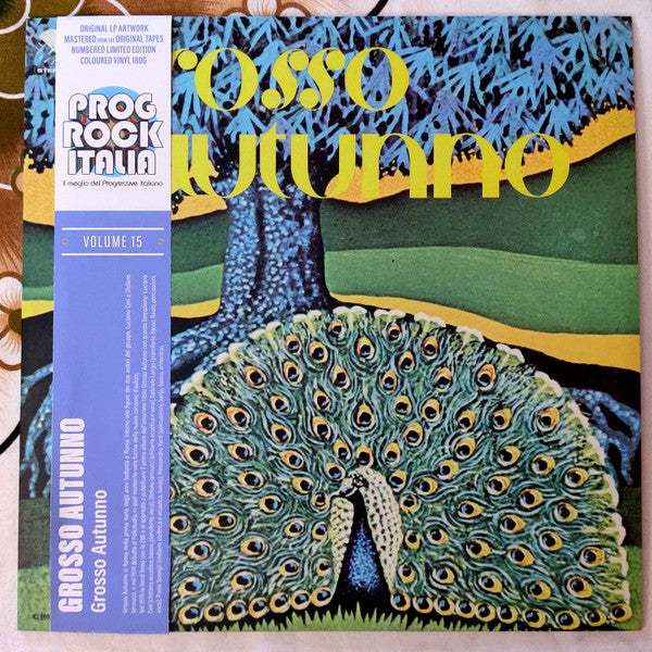Yellow vinyl record cover featuring a vibrant peacock illustration and text.