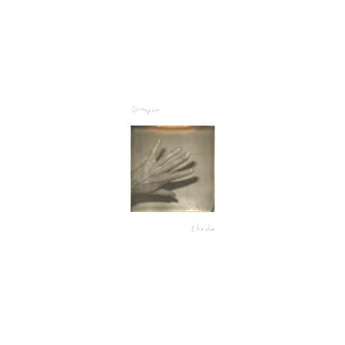 Album cover with a hand photograph centered, text Grouper above and Shade below.