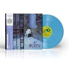 Blue vinyl record and album cover with a figure by a gate.
