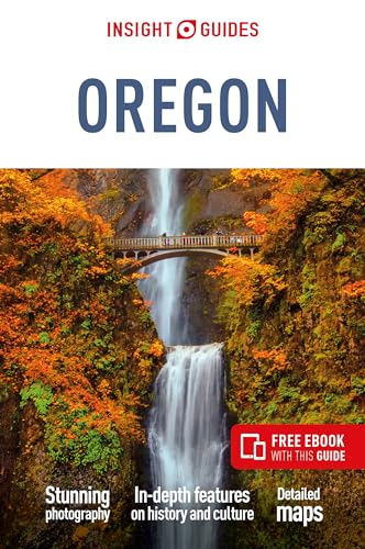 Insight Guides Oregon travel book cover featuring Multnomah Falls with a bridge and autumn foliage.