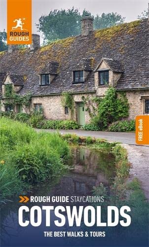 Stone cottage with a slate roof beside a stream, featured on a travel guide.