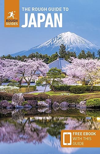Book cover showing Mount Fuji, cherry blossoms, and a pond with a reflection.