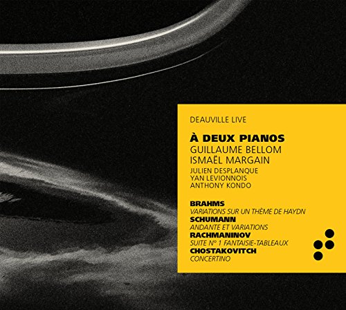 "CD cover with a black piano and yellow text box listing musical pieces and artists."