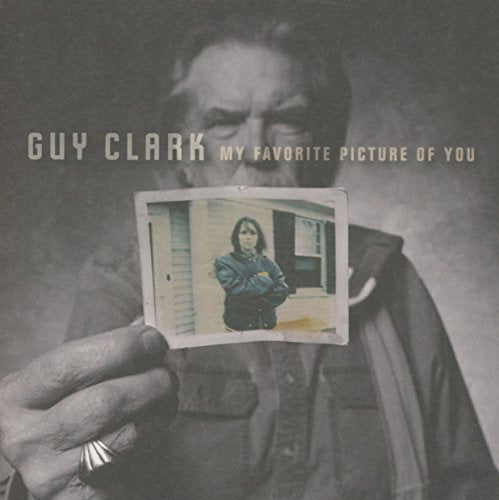 Guy Clark album cover featuring a man holding a faded photograph.