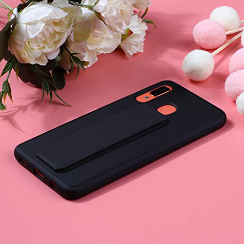 Black phone case with orange accents, resting among pink flowers.