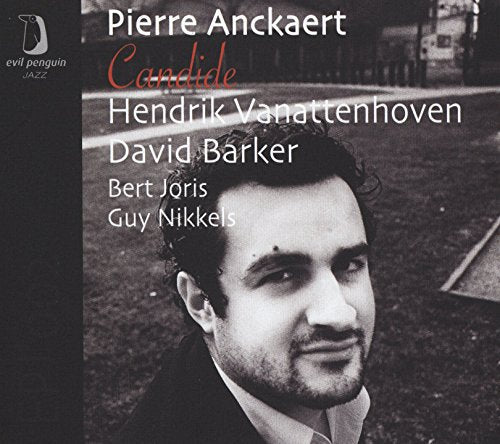 "Album cover with black and white photo of a man and artist names."