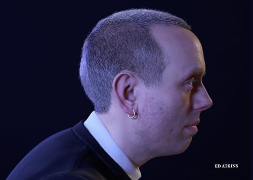 Profile portrait of Ed Atkins, a man with short grey hair, in a suit.