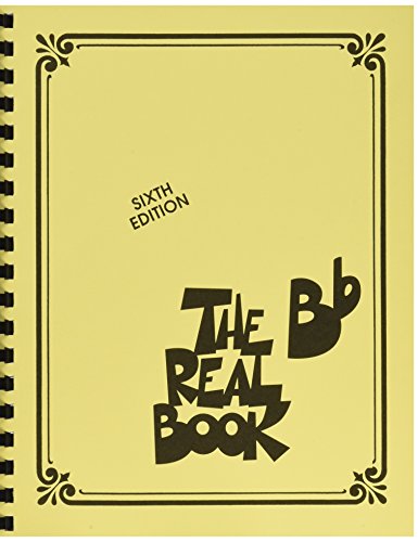 Spiral-bound yellow cover of The Real Book Sixth Edition for Bb instruments.